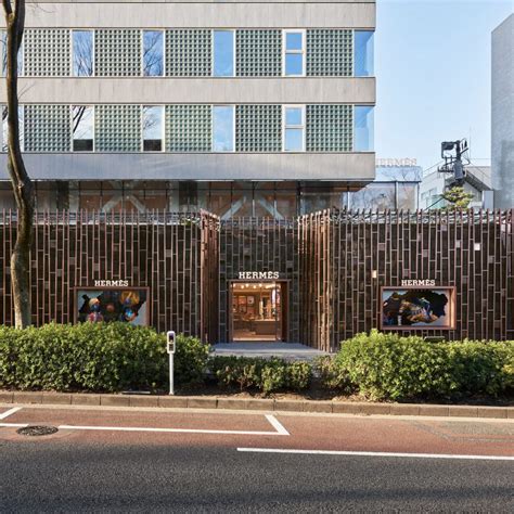 Gridded steel facade evokes bamboo forest at Hermès store in 